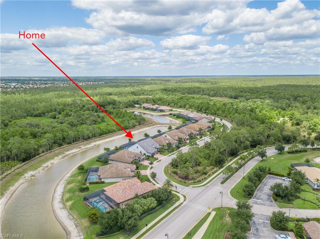 7247 Clamshell Lane Naples, FL 34114 - Photo 33 of 33 a view of a backyard with plants