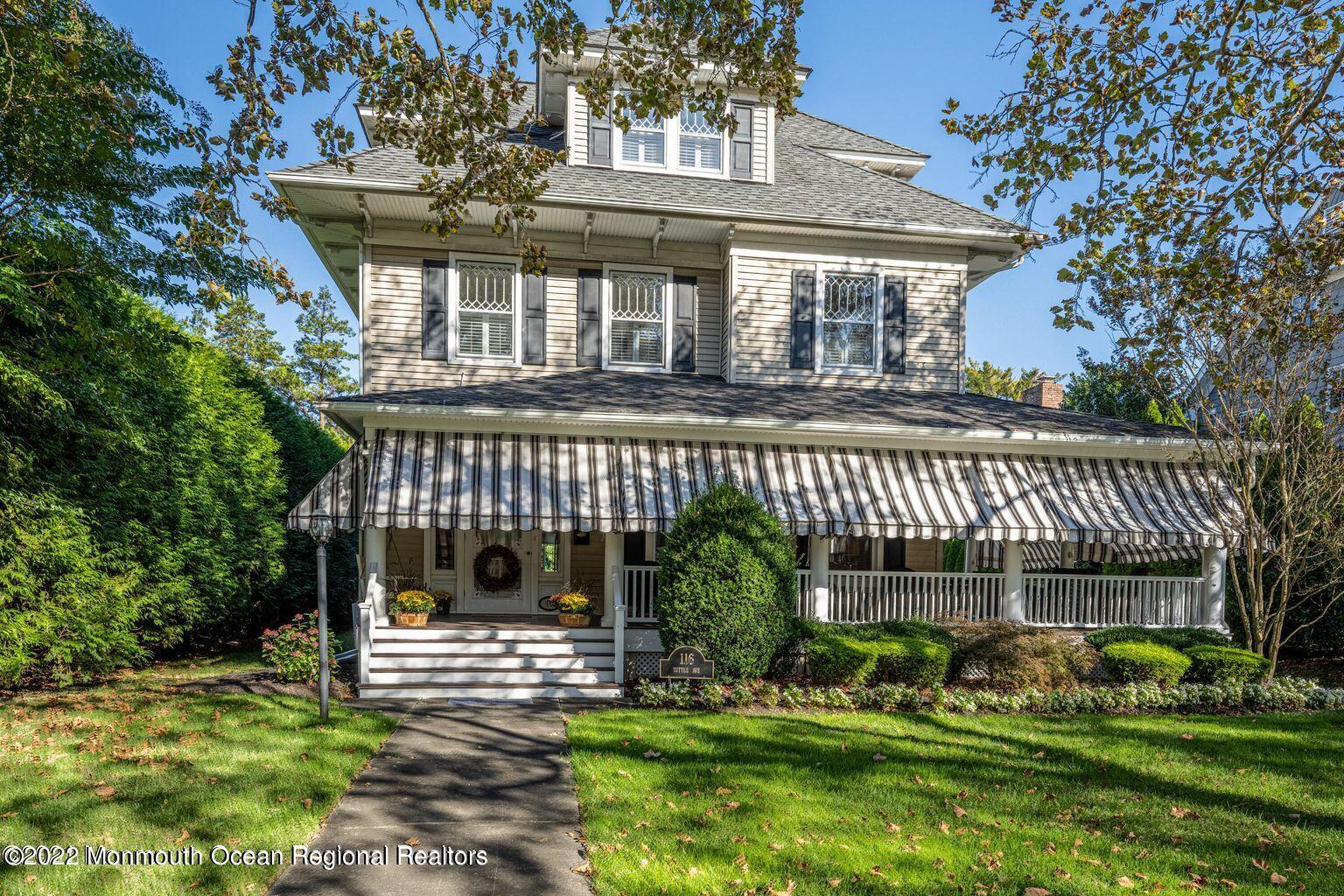 116 Tuttle Avenue, Unit WINTER 20232024 Spring Lake, NJ 07762 - Photo 2 of 44 front view of a house with a garden