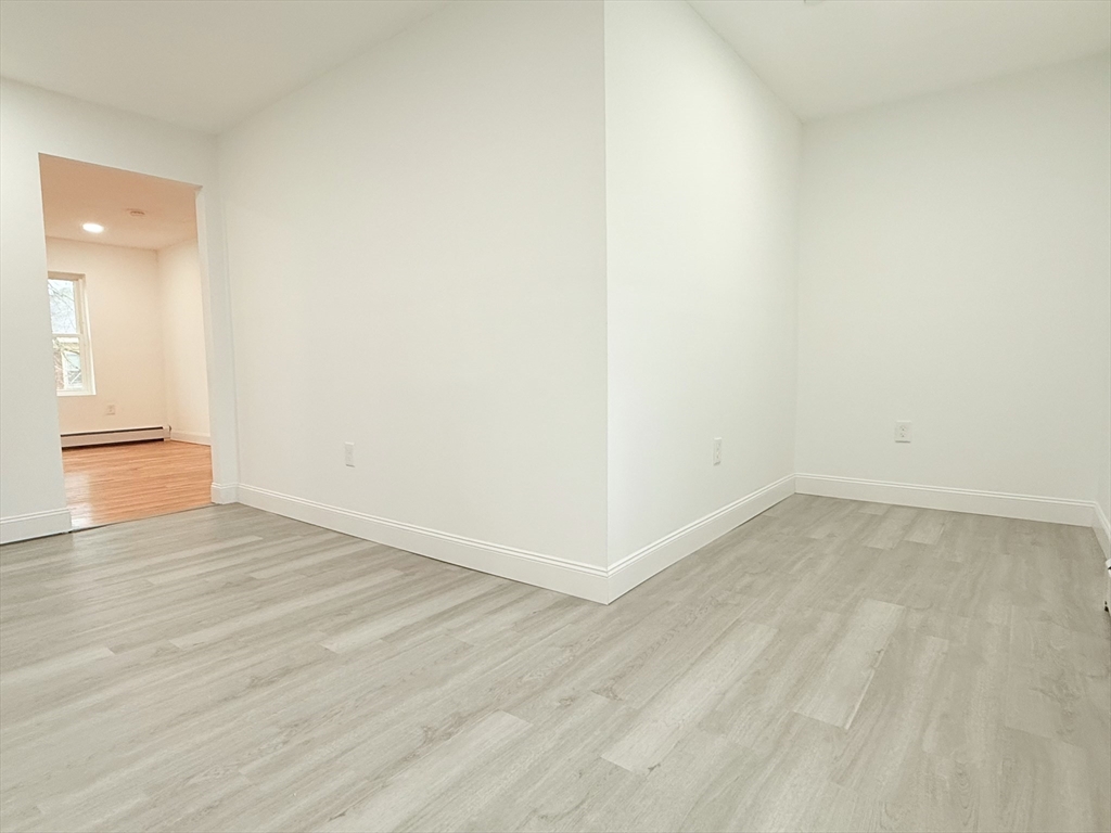 23 Bellevue Street, Unit 3 Worcester, MA 01609 - Photo 15 of 26 wooden floor in a room