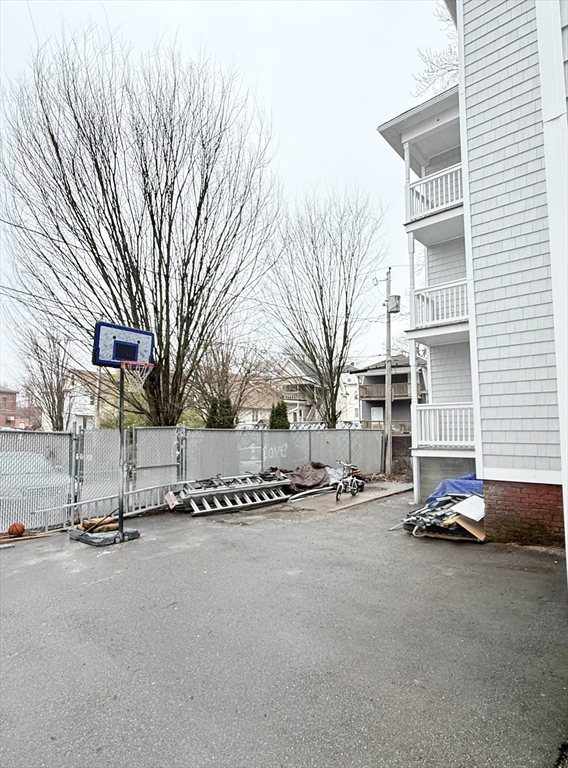 23 Bellevue Street, Unit 3 Worcester, MA 01609 - Photo 24 of 26 a view of a street with a building in the background