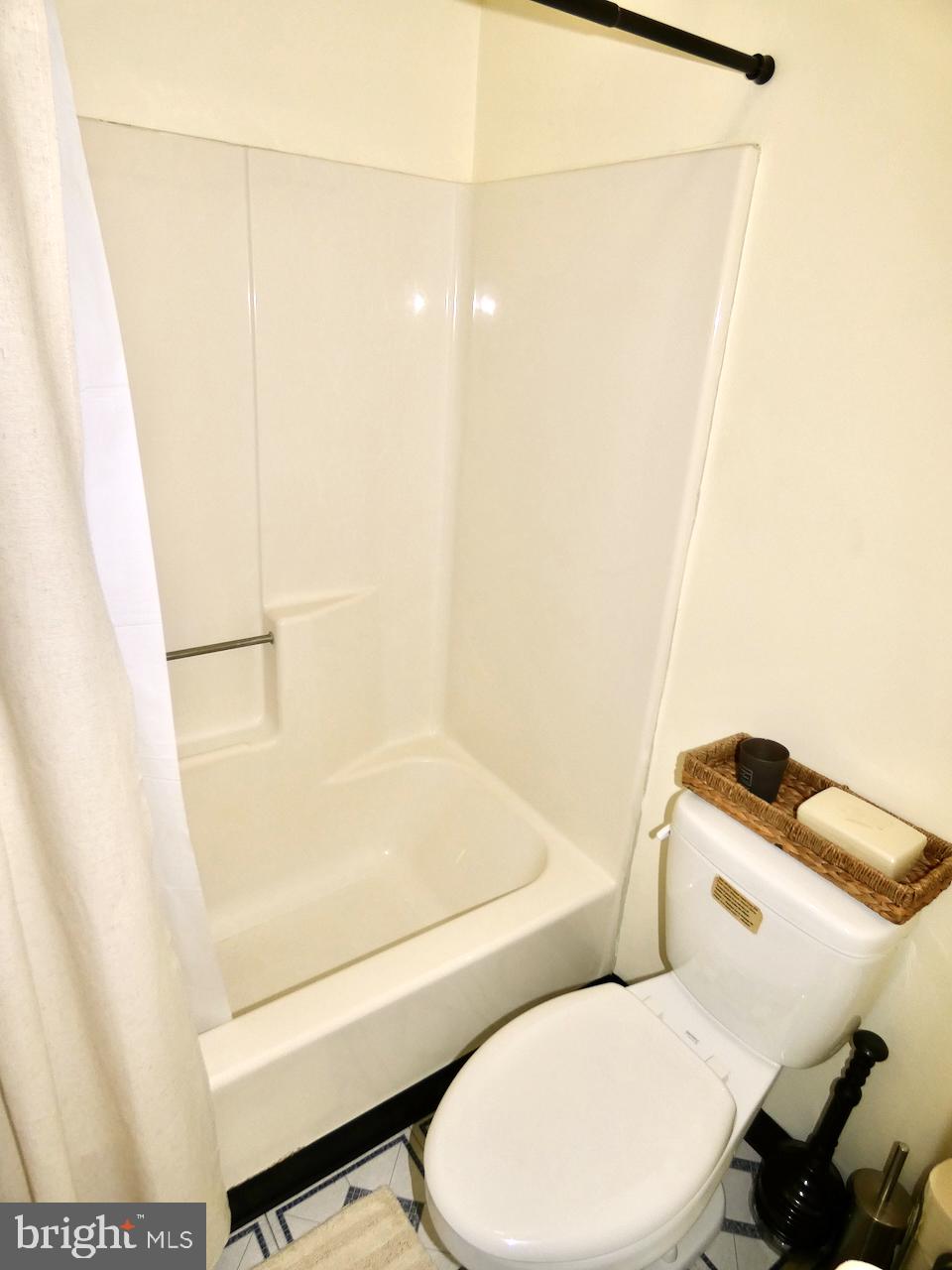 5 Acapella Court Newark, DE 19713 - Photo 25 of 68 a bathroom with a toilet and a shower