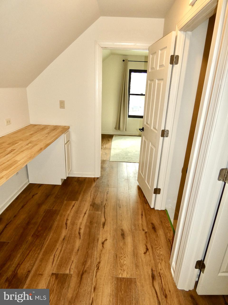5 Acapella Court Newark, DE 19713 - Photo 37 of 68 a view of a hallway view with wooden floor and staircase