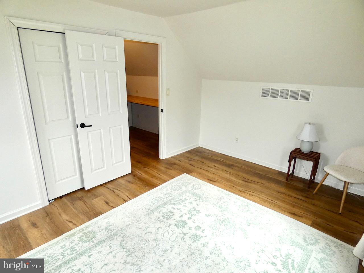 5 Acapella Court Newark, DE 19713 - Photo 44 of 68 a view of a bedroom with wooden floor and a sink