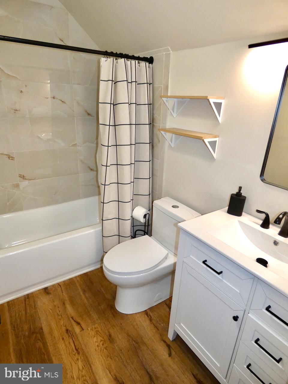 5 Acapella Court Newark, DE 19713 - Photo 46 of 68 a bathroom with a sink toilet and shower