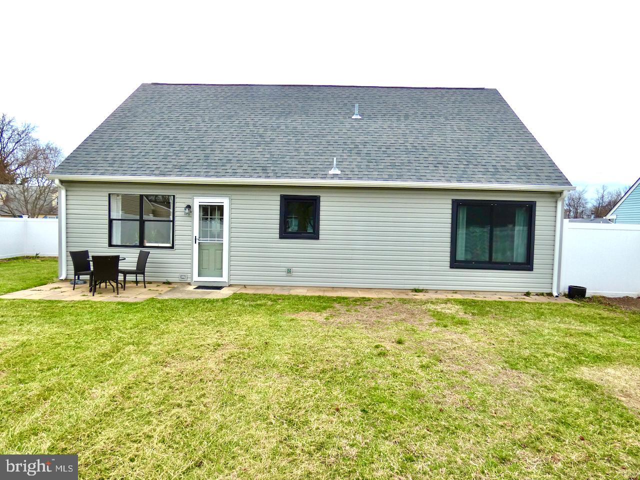 5 Acapella Court Newark, DE 19713 - Photo 65 of 68 a backyard of a house with table and chairs