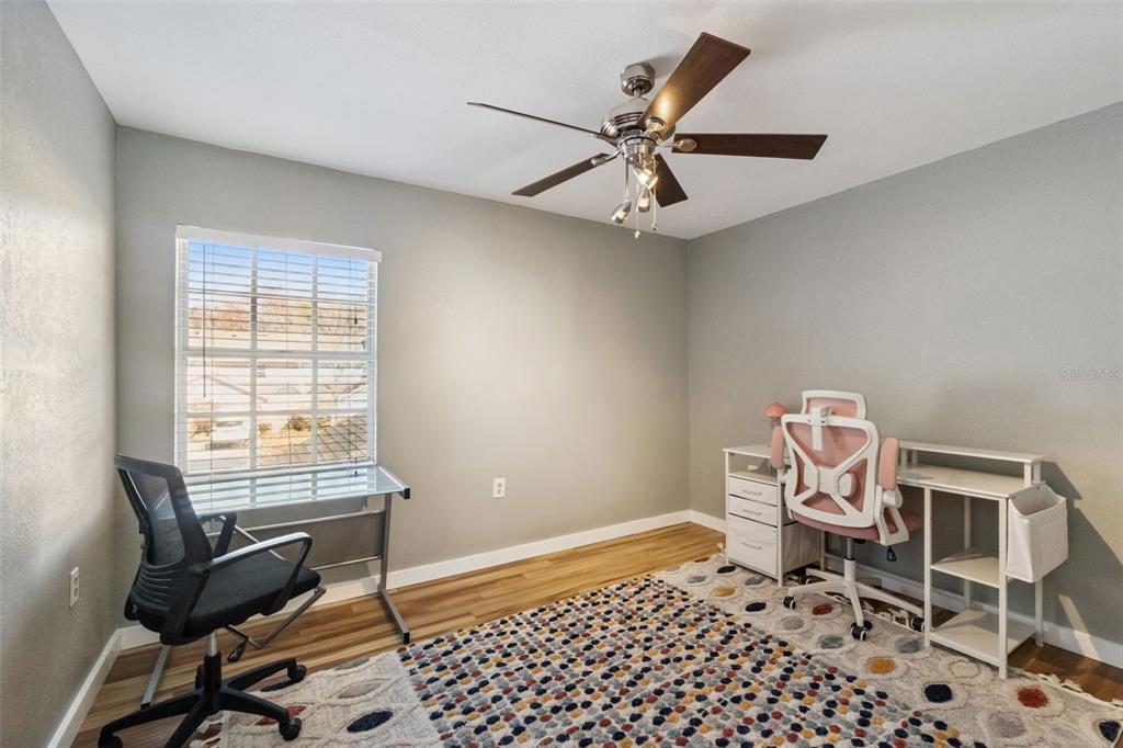 2613 East Church Street Orlando, FL 32803 - Photo 14 of 32 a workspace with furniture and a window