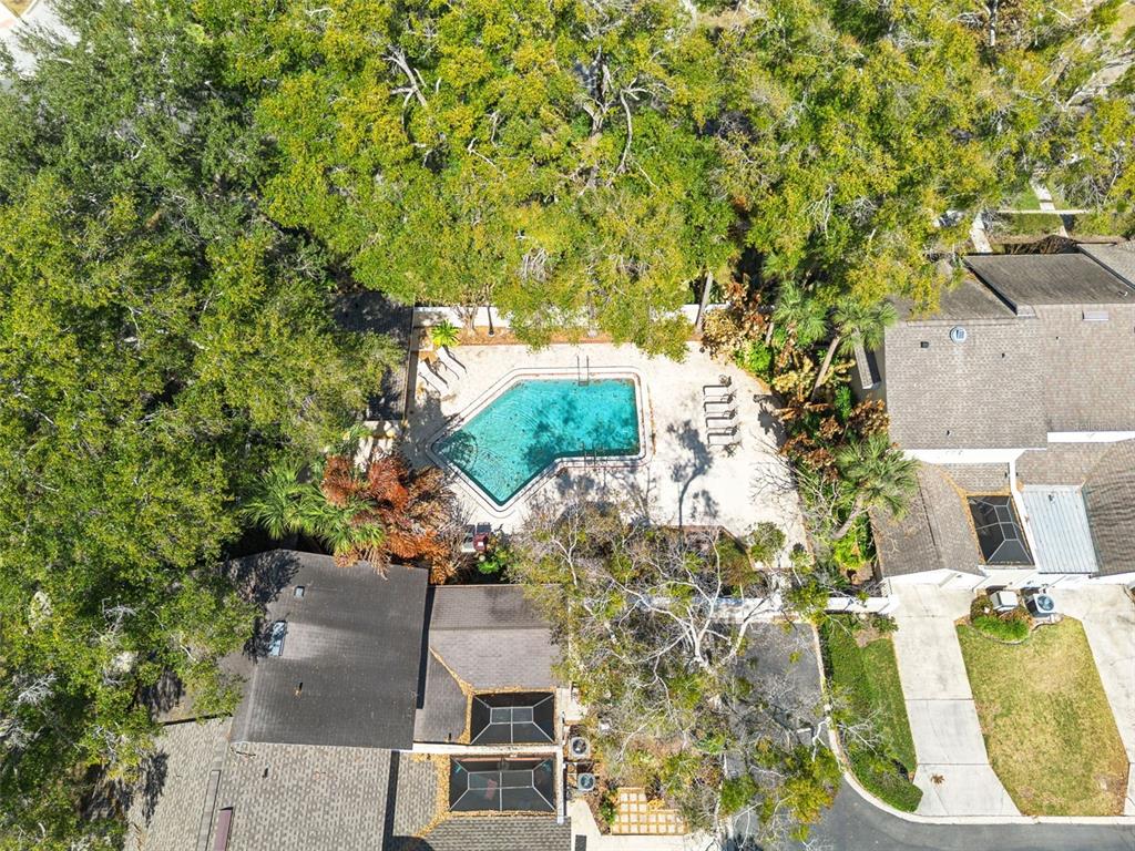 2613 East Church Street Orlando, FL 32803 - Photo 25 of 32 an aerial view of a house with swimming pool