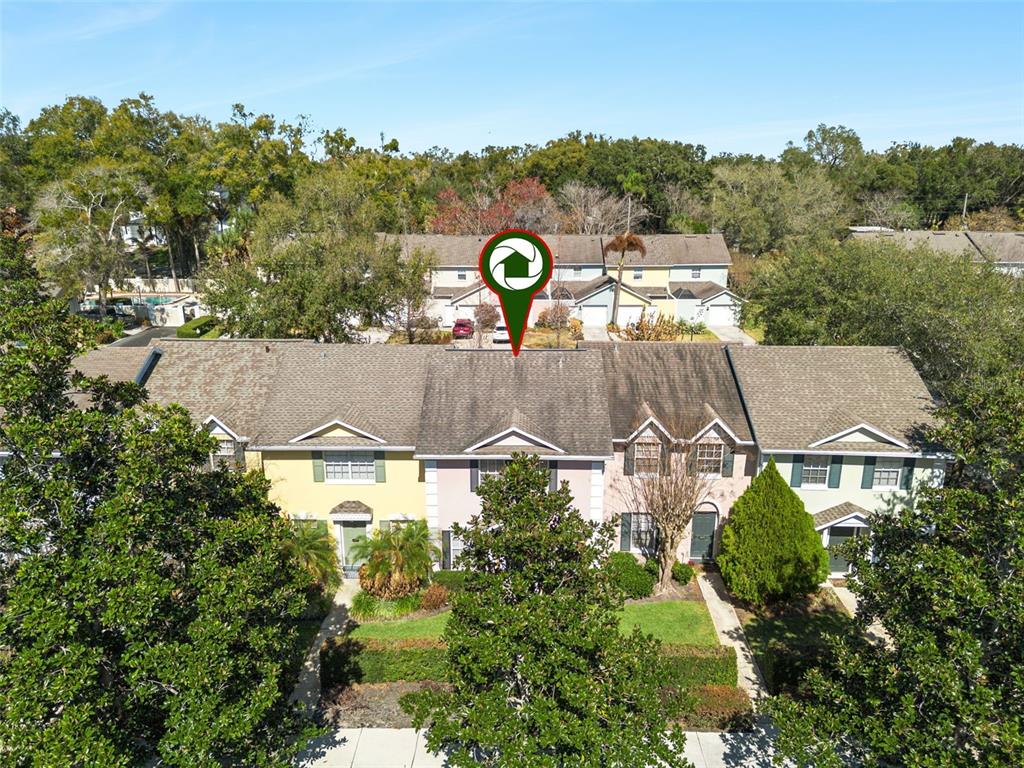 2613 East Church Street Orlando, FL 32803 - Photo 26 of 32 an aerial view of a house with yard swimming pool and outdoor seating