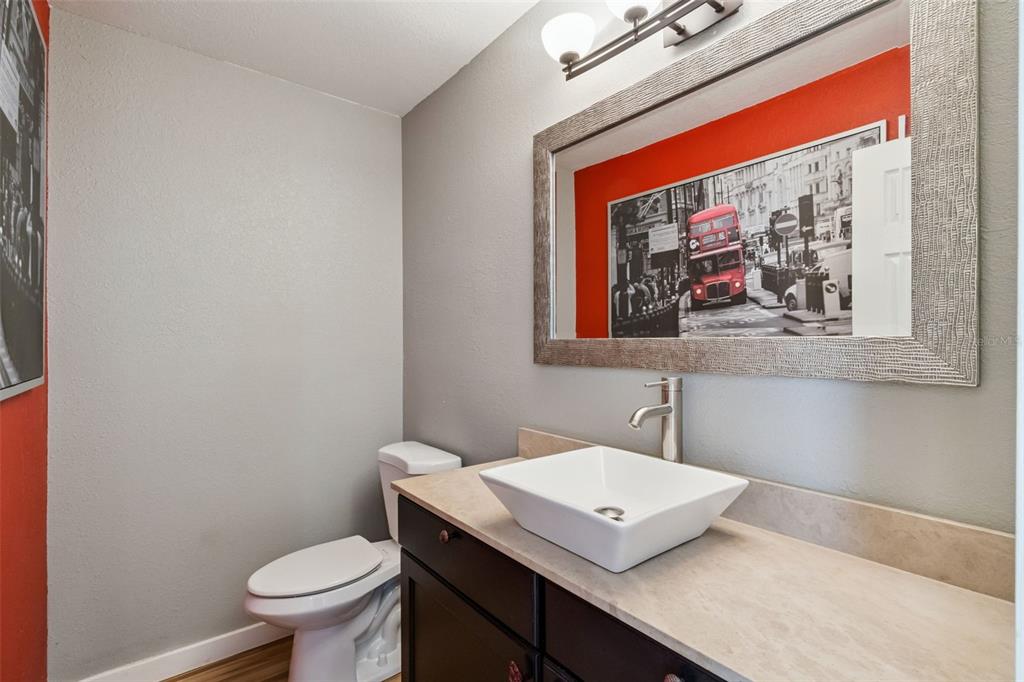 2613 East Church Street Orlando, FL 32803 - Photo 9 of 32 a view of bathroom with a toilet and sink
