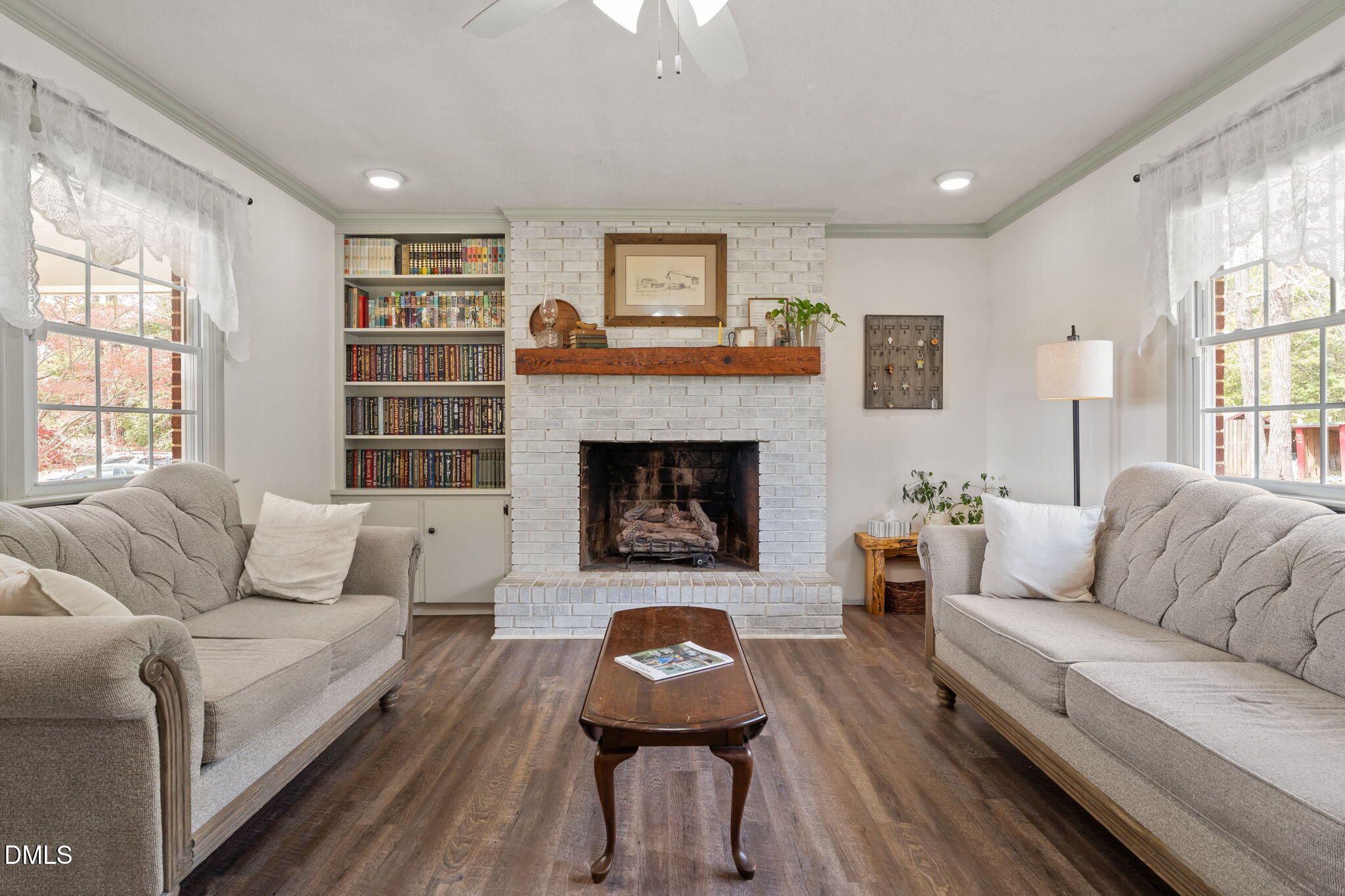 4313 Mitchell Mill Road Wake Forest, NC 27587 - Photo 6 of 45 a living room with furniture and a fireplace