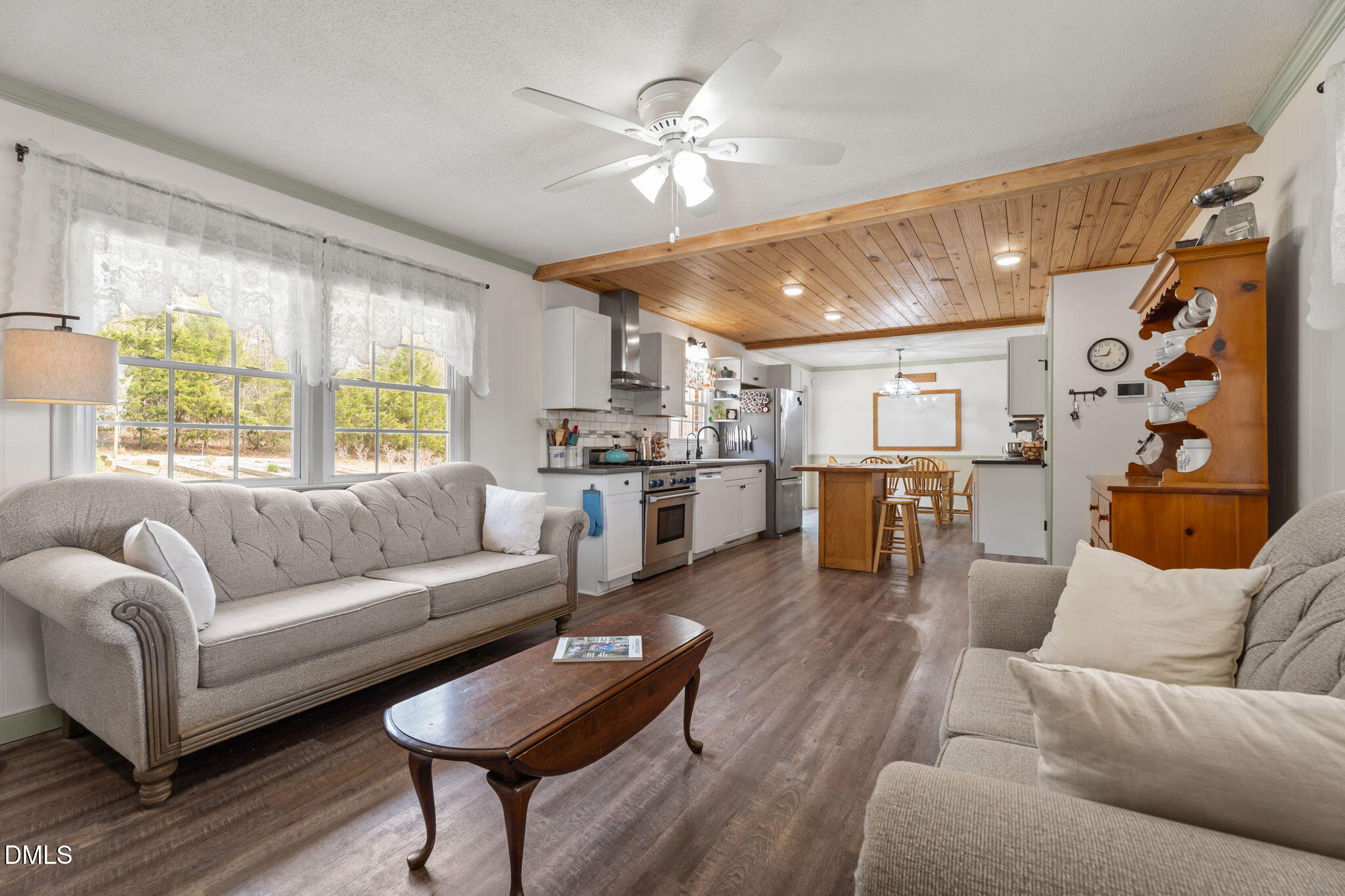 4313 Mitchell Mill Road Wake Forest, NC 27587 - Photo 7 of 45 a living room with furniture and kitchen view