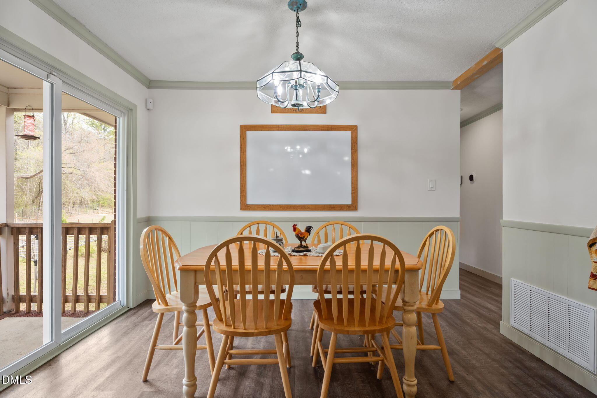 4313 Mitchell Mill Road Wake Forest, NC 27587 - Photo 14 of 45 a view of a dining room with furniture window and wooden floor