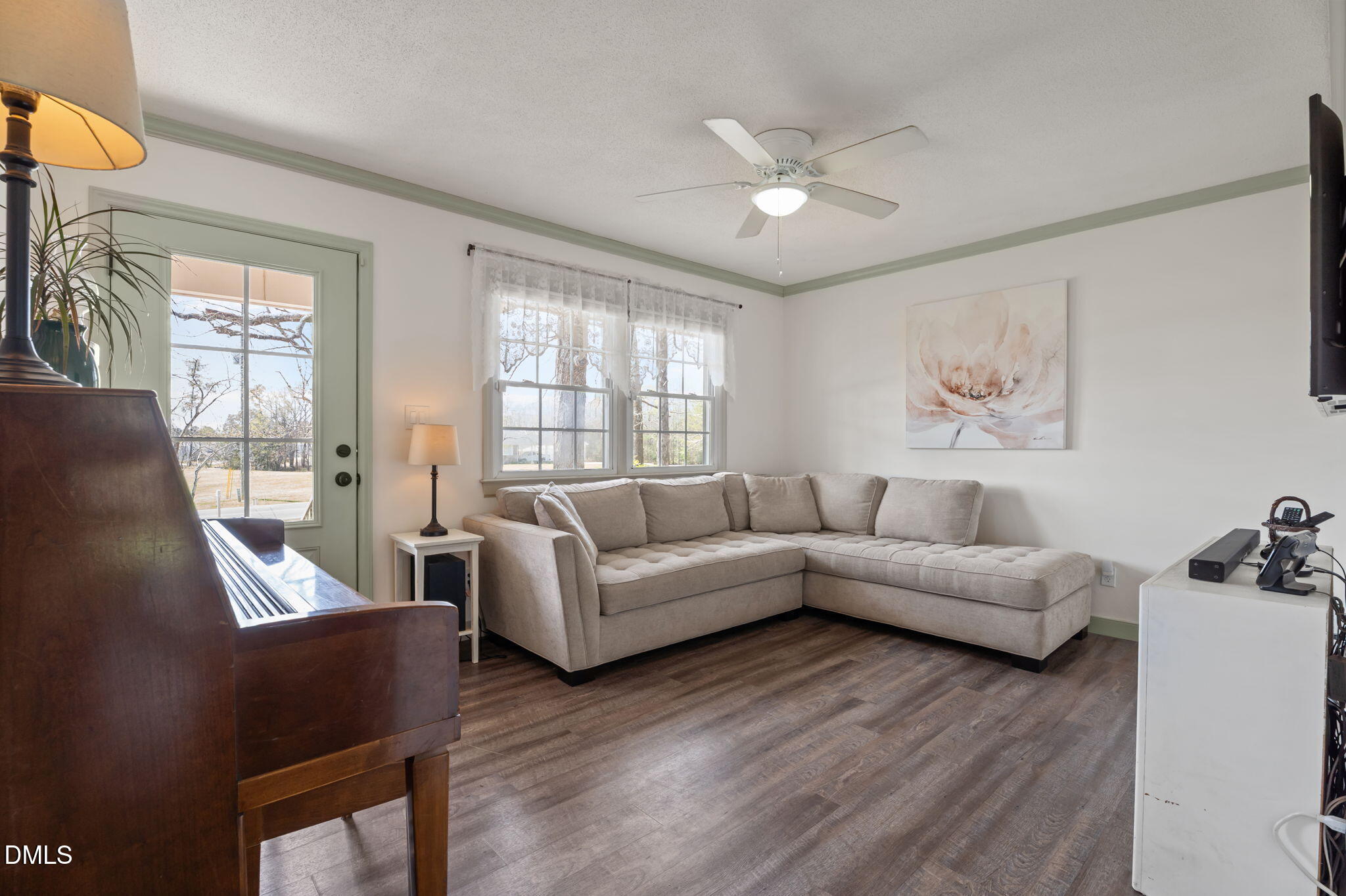 4313 Mitchell Mill Road Wake Forest, NC 27587 - Photo 16 of 45 a living room with furniture and a large window