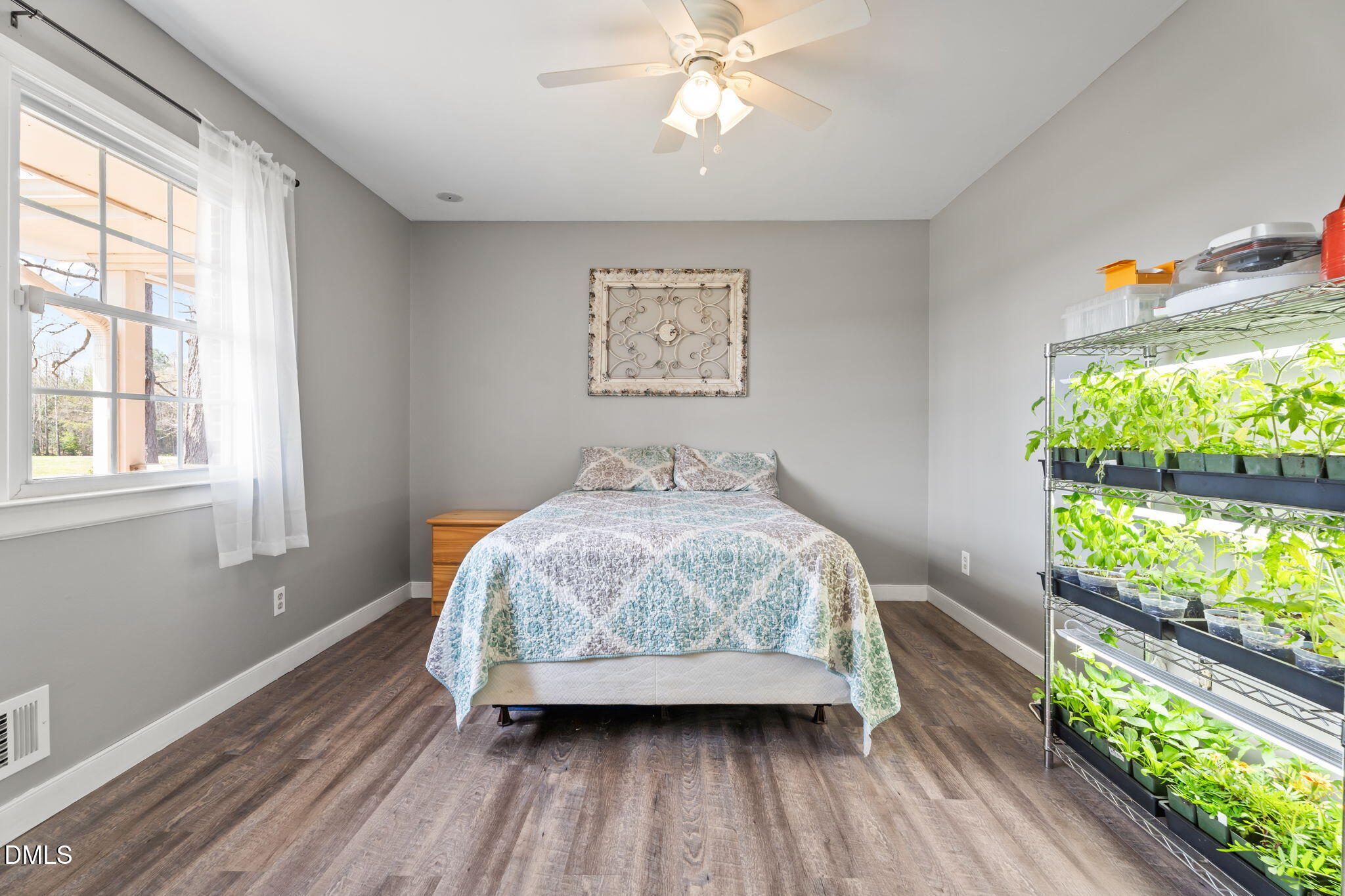 4313 Mitchell Mill Road Wake Forest, NC 27587 - Photo 17 of 45 a bedroom with a bed and a window