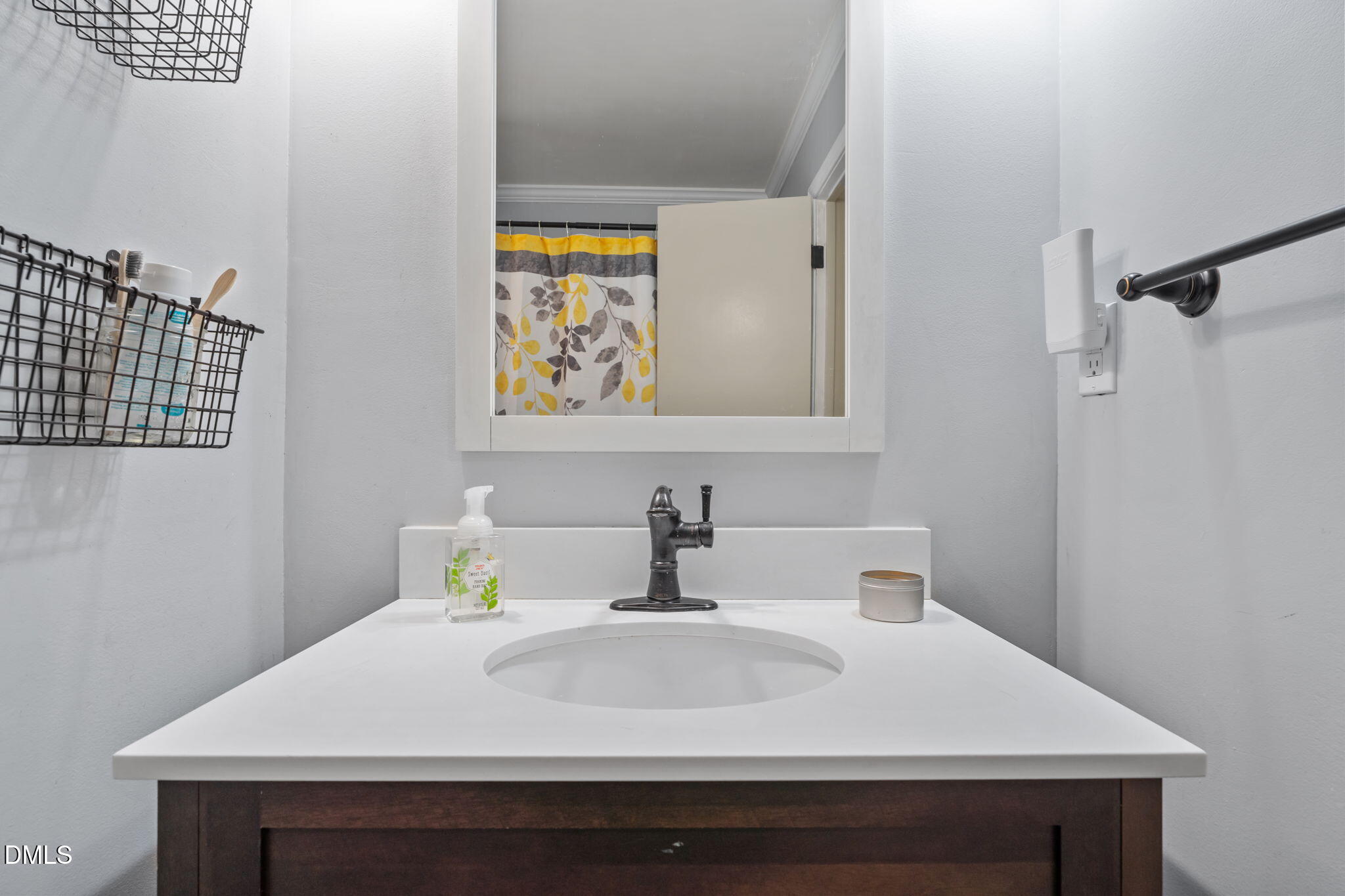 4313 Mitchell Mill Road Wake Forest, NC 27587 - Photo 21 of 45 a bathroom with a sink and a mirror