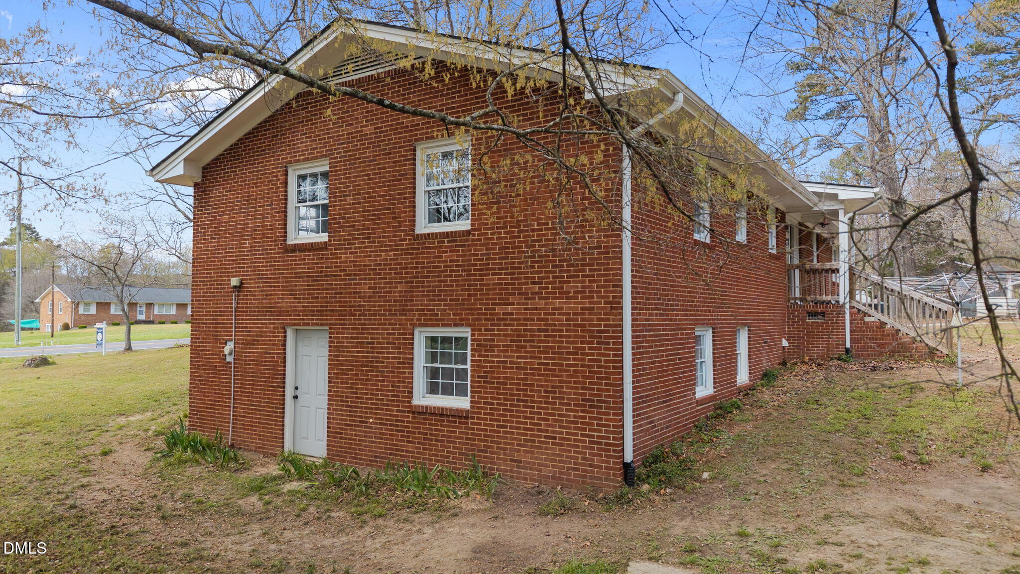4313 Mitchell Mill Road Wake Forest, NC 27587 - Photo 5 of 45 a front view of a house with garden