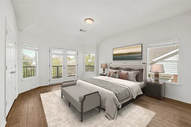 a balcony with wooden floor in city view