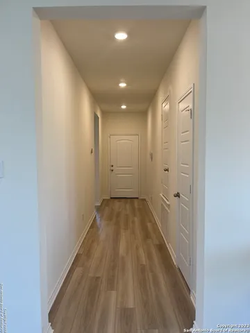 a bathroom with a double vanity sink toilet and a mirror