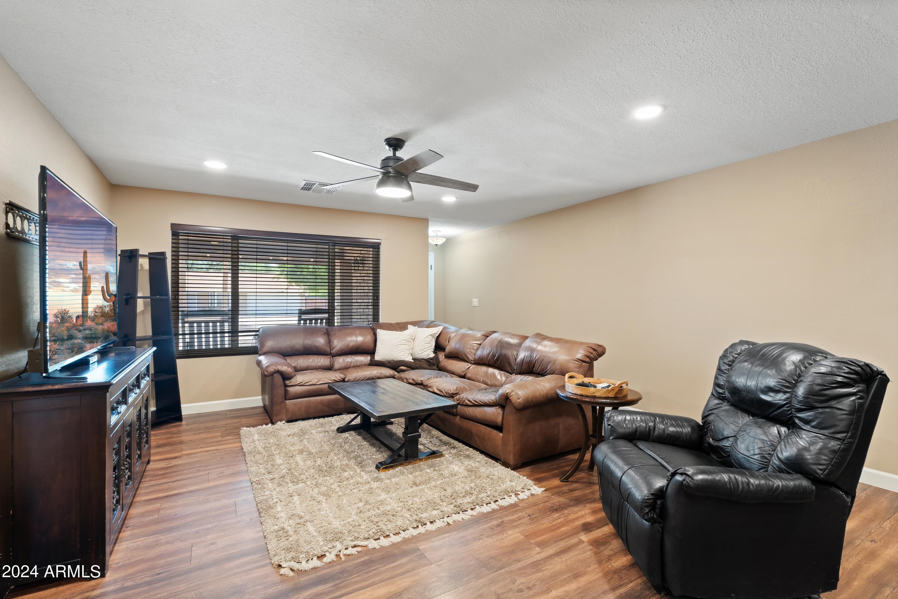 4426 East Phelps Road Phoenix, AZ 85032 - Photo 7 of 36 07-Living Room