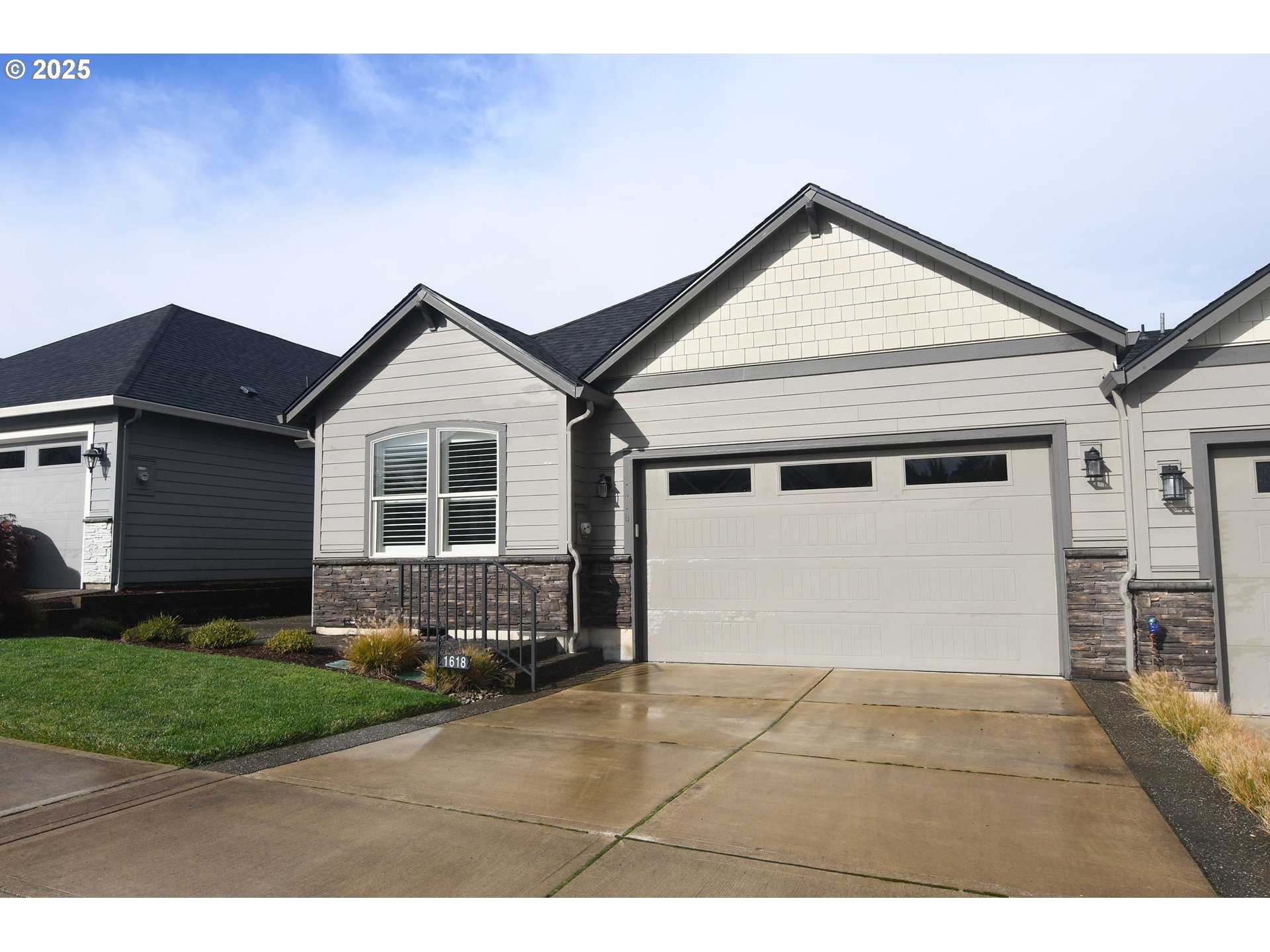 1618 Northeast 174th Street Ridgefield, WA 98642 - Photo 2 of 46 a front view of a house with a yard