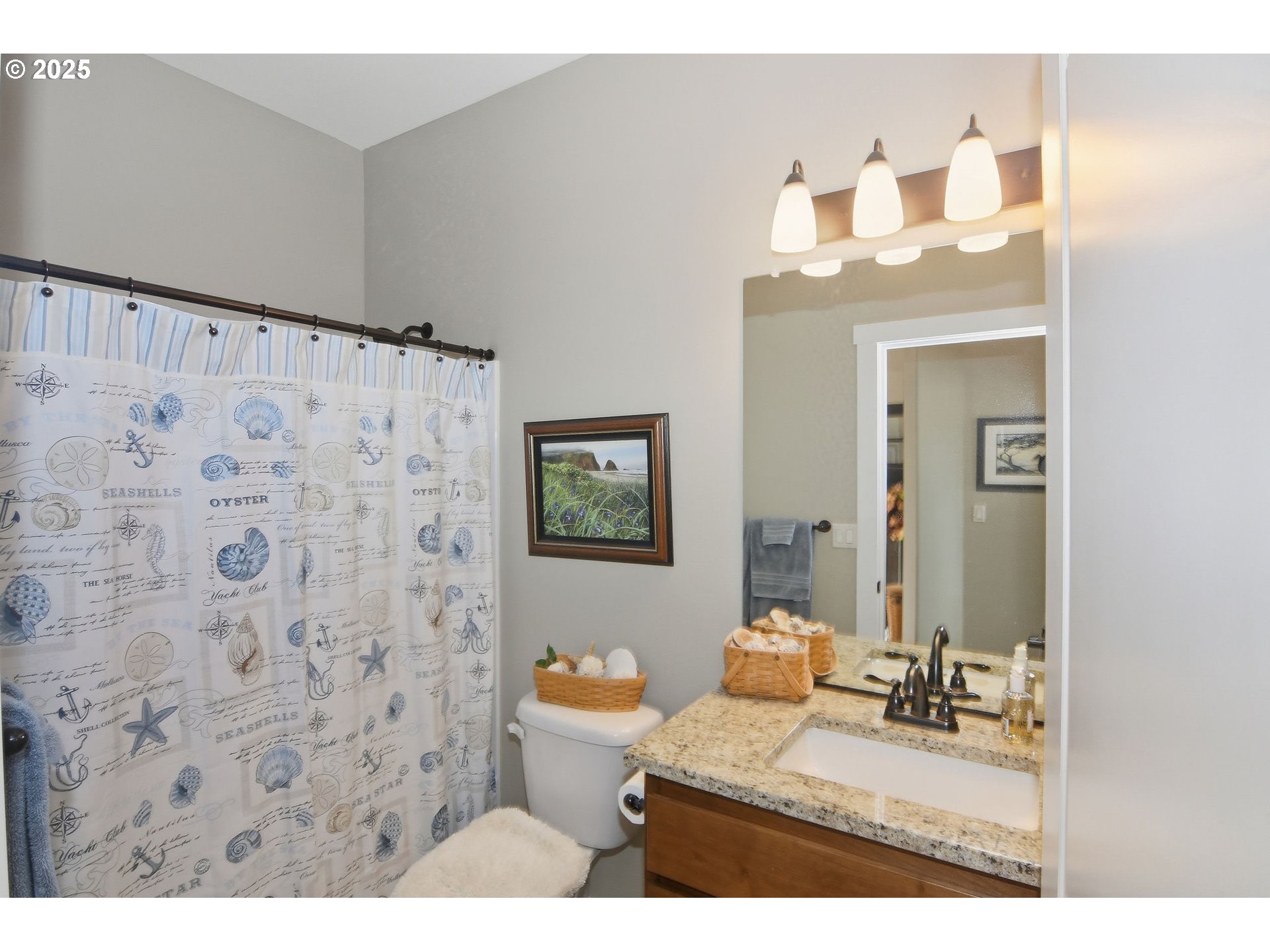1618 Northeast 174th Street Ridgefield, WA 98642 - Photo 33 of 46 a bathroom with a sink mirror and vanity