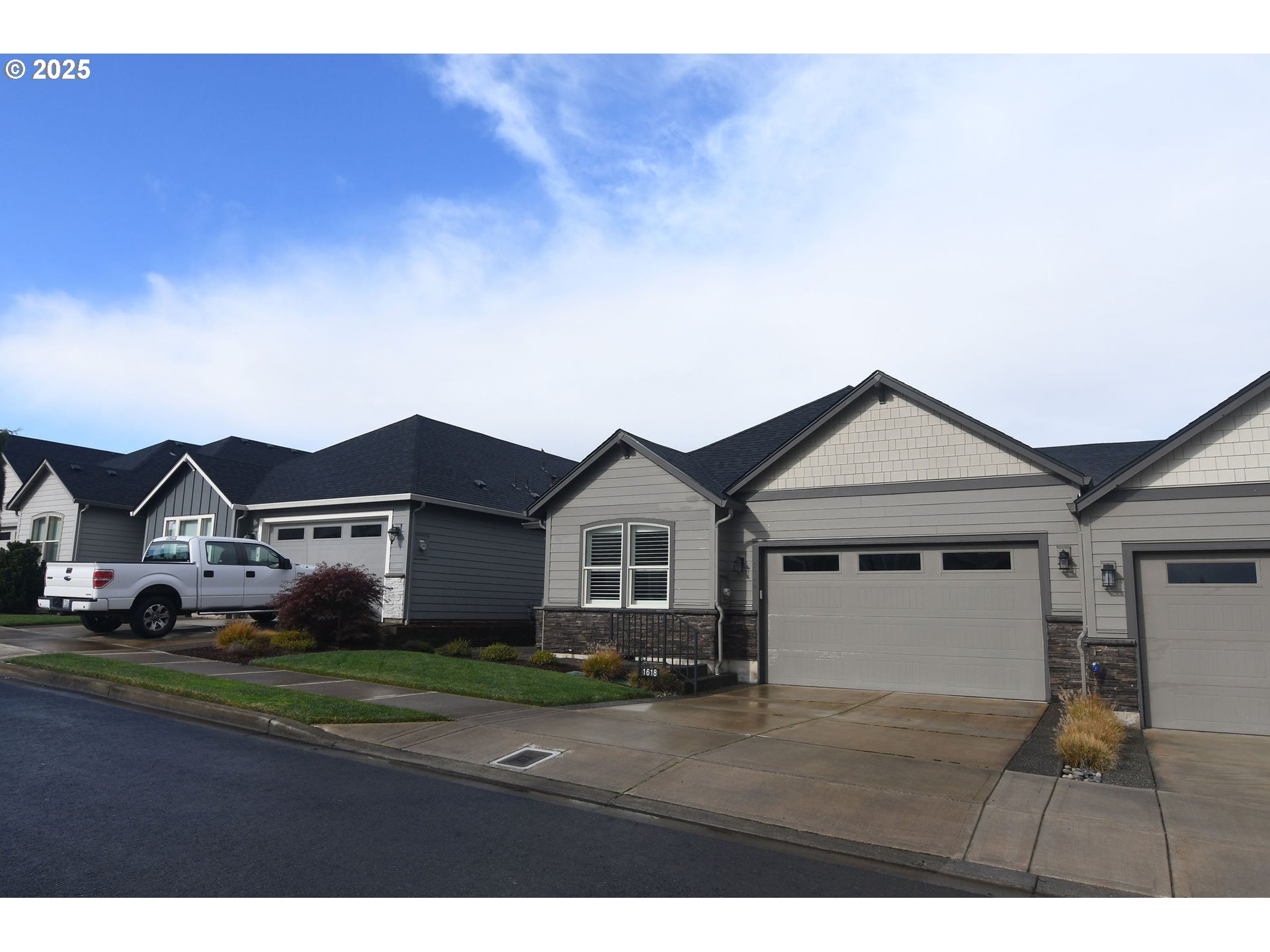 1618 Northeast 174th Street Ridgefield, WA 98642 - Photo 45 of 46 a front view of a house with a garden
