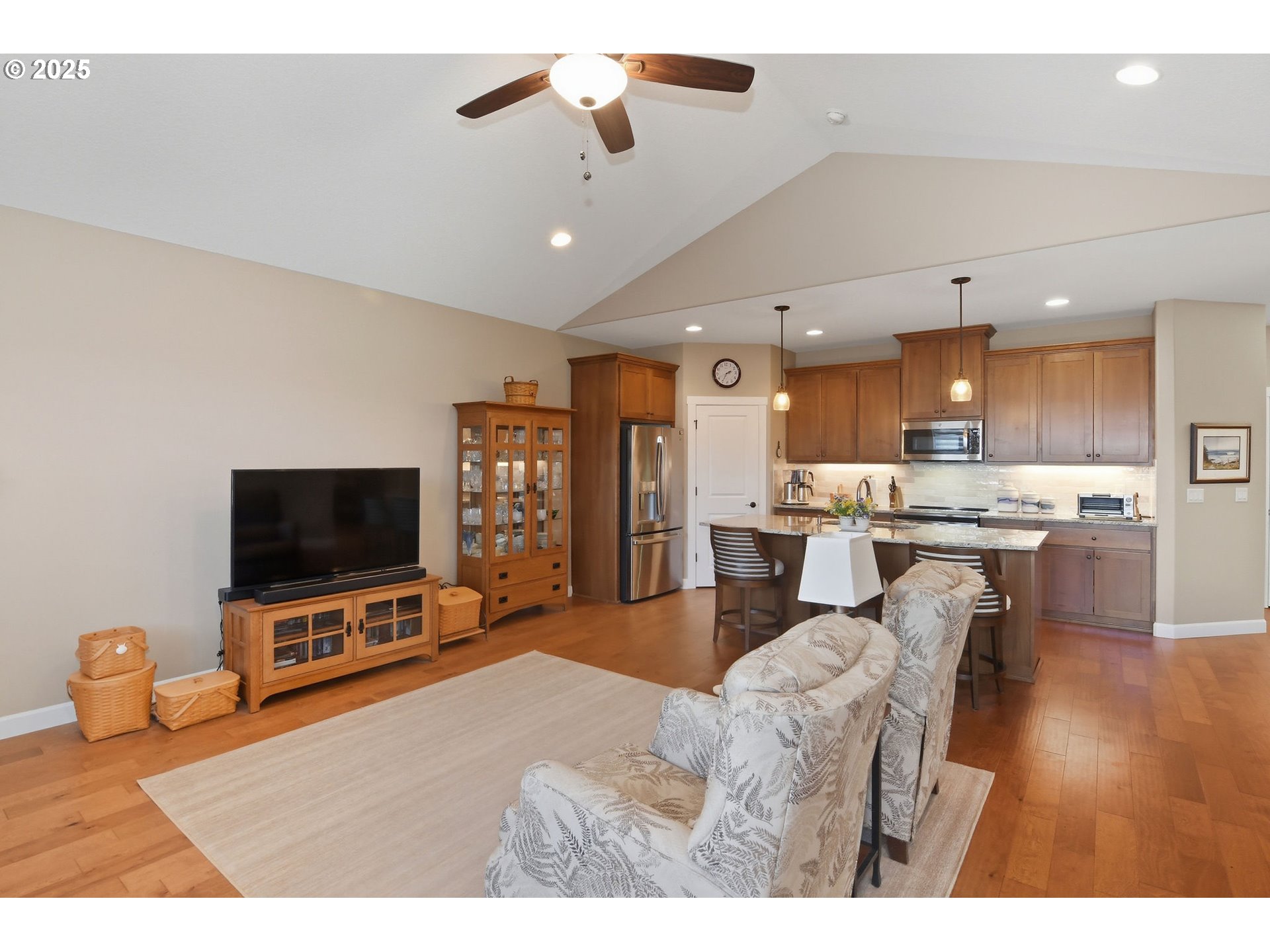 1618 Northeast 174th Street Ridgefield, WA 98642 - Photo 9 of 46 a living room with furniture and a flat screen tv