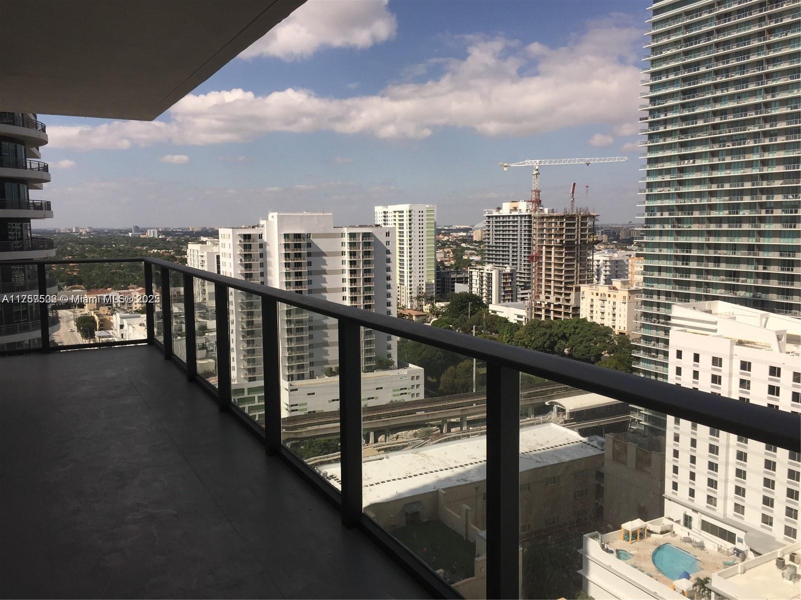 1300 South Miami Avenue, Unit 1910 Miami, FL 33130 - Photo 14 of 14 a view of city from a balcony