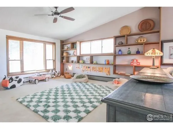 a kitchen with sink cabinets and wooden floor