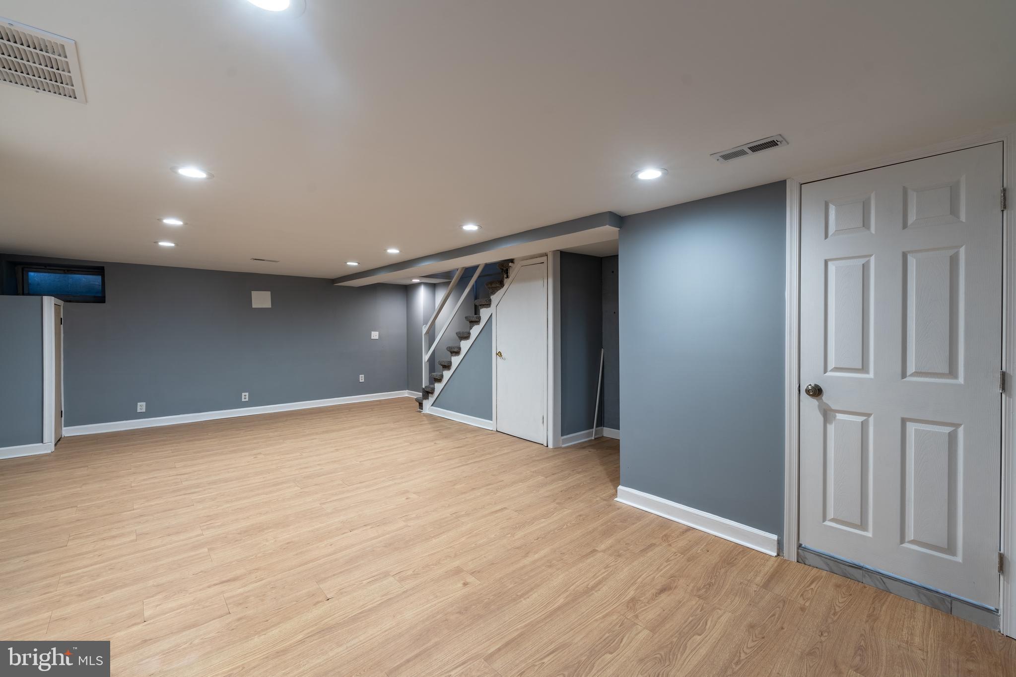 3929 Yolando Road Baltimore, MD 21218 - Photo 15 of 21 a view of an empty room with wooden floor