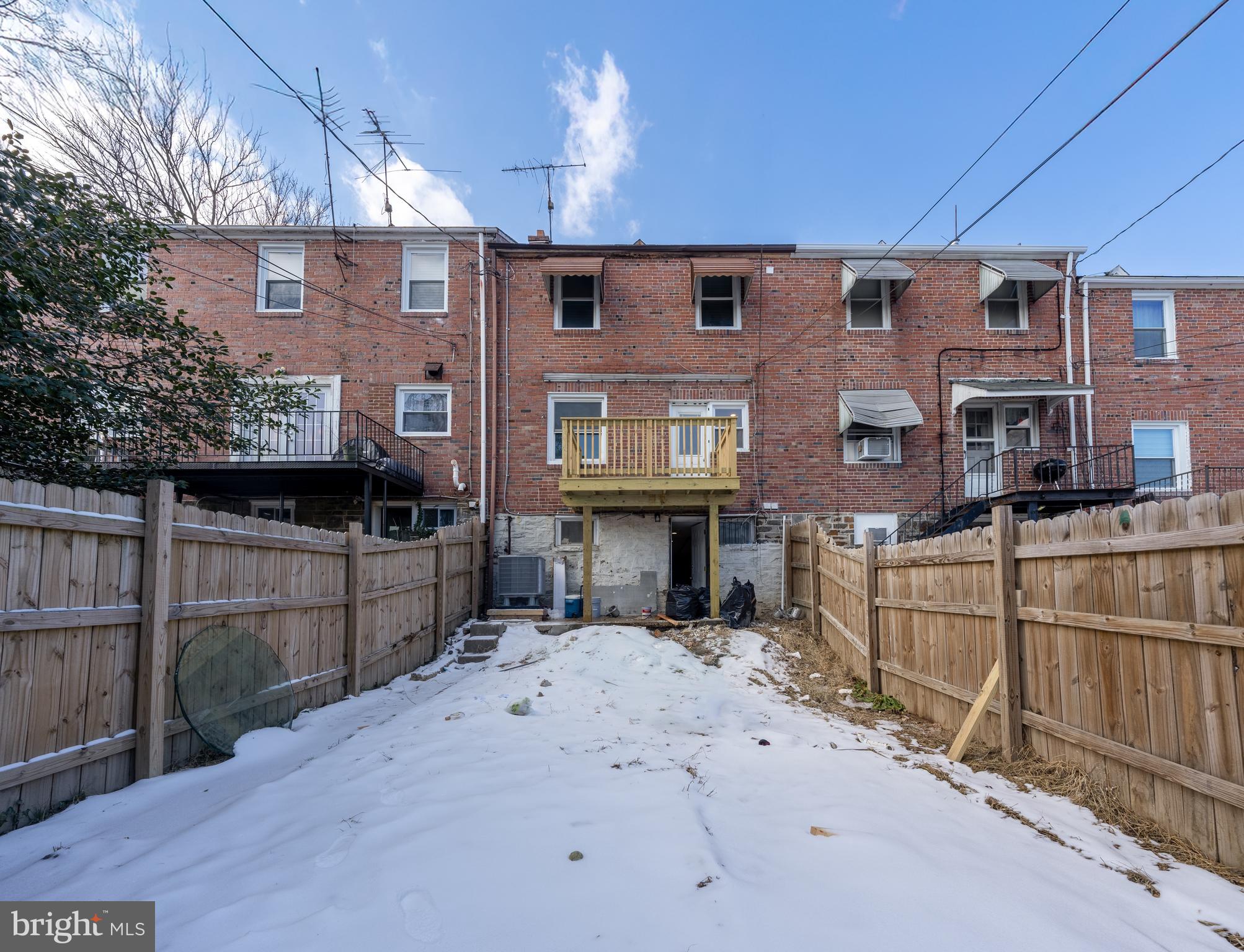 3929 Yolando Road Baltimore, MD 21218 - Photo 20 of 21 a view of a house with wooden fence
