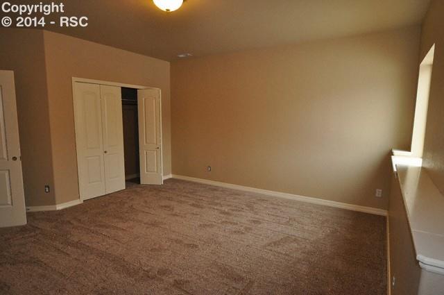 15892 Maple Hill Road Monument, CO 80132 - Photo 17 of 22 Huge bedroom in basement