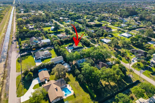 $999,900 | 8811 Pinion Drive, Wellington, FL 33467