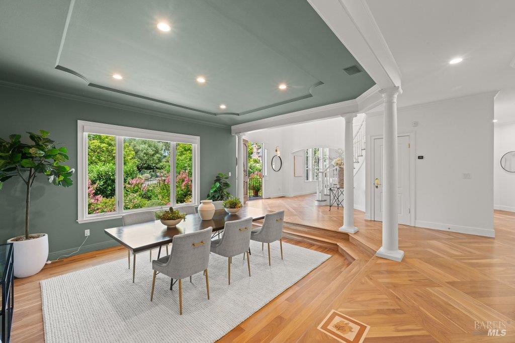 82 McNear Drive San Rafael, CA 94901 - Photo 15 of 54 a dining room with furniture and a large window