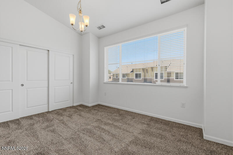 285 Mark Jeffrey Lane Reno, NV 89503 - Photo 10 of 20 a view of an empty room with a window