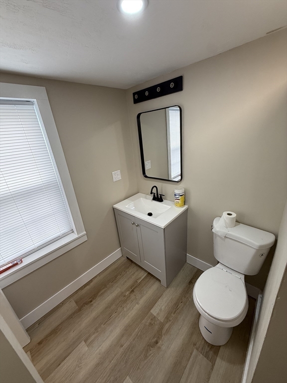 44 South Street Ware, MA 01082 - Photo 14 of 42 a bathroom with a toilet sink and mirror