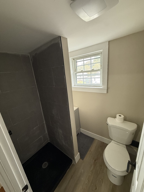 44 South Street Ware, MA 01082 - Photo 17 of 42 a bathroom with a granite countertop toilet and a sink