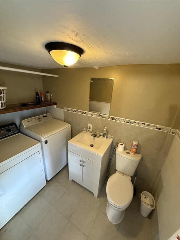 44 South Street Ware, MA 01082 - Photo 33 of 42 a bathroom with a sink and a mirror