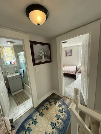 a bathroom with a toilet a sink and bathtub