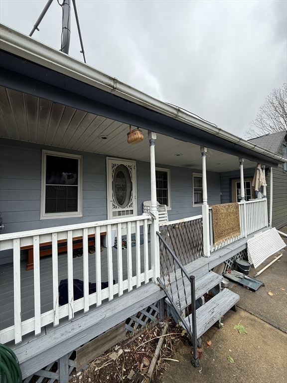 44 South Street Ware, MA 01082 - Photo 6 of 42 a view of a house with a wooden deck