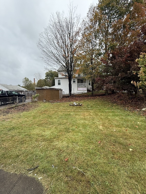44 South Street Ware, MA 01082 - Photo 9 of 42 a view of a large pool with an outdoor space and seating area