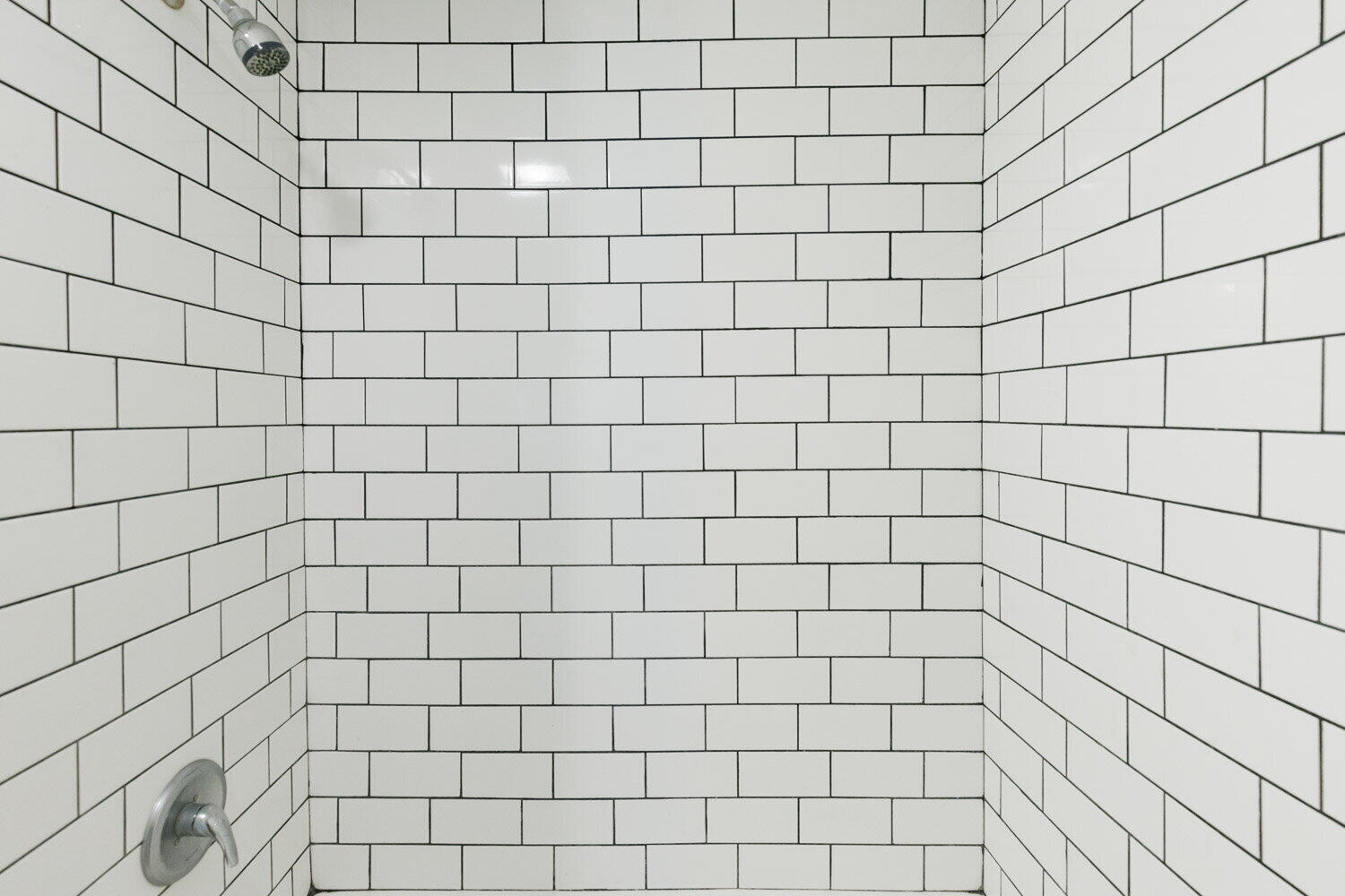 3605 26th Street Lubbock, TX 79410 - Photo 14 of 21 a bathroom with a shower