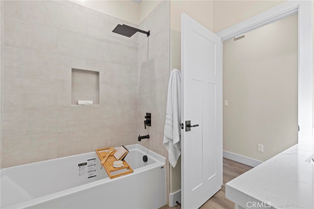 6148 Ripley Lane Paradise, CA 95969 - Photo 18 of 37 a bathroom with a bathtub and a shower