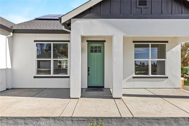 a front view of a house with a garage