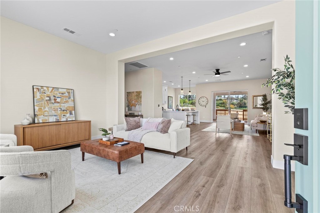 6148 Ripley Lane Paradise, CA 95969 - Photo 3 of 37 a living room with furniture and a wooden floor