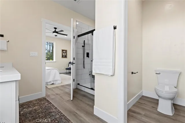 a view of a room with wooden floor and balcony