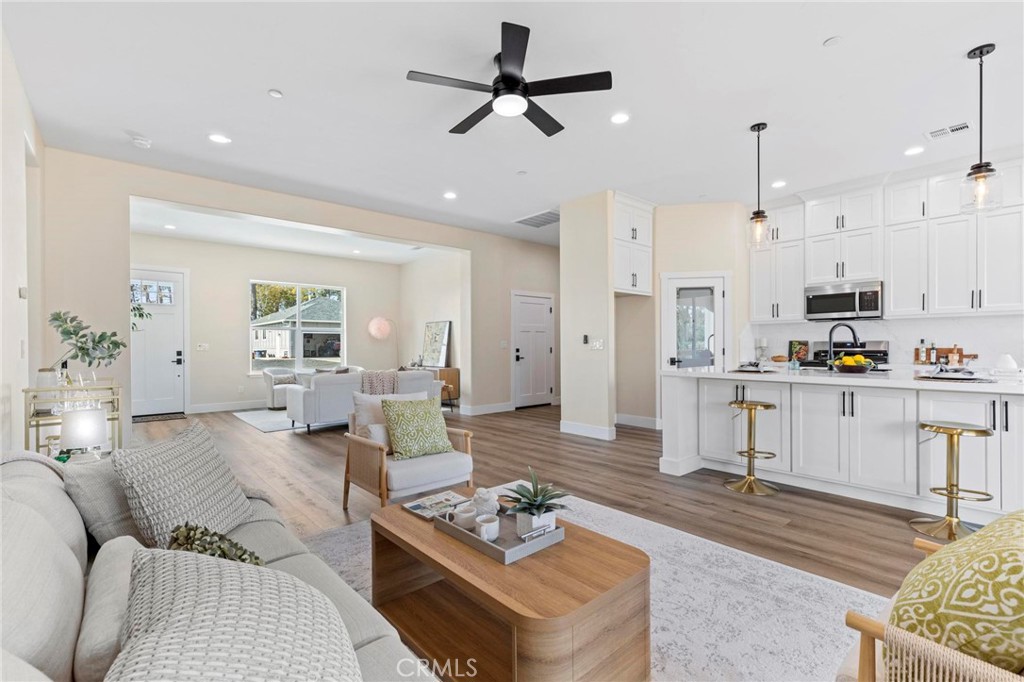 6148 Ripley Lane Paradise, CA 95969 - Photo 32 of 37 a living room with furniture and kitchen view