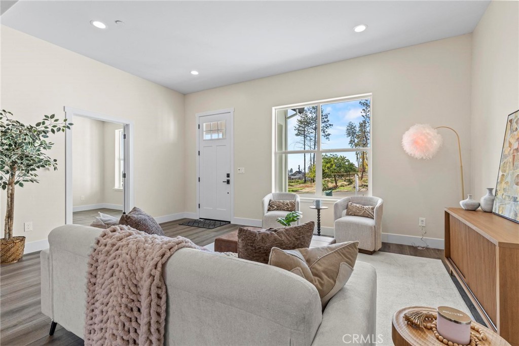 6148 Ripley Lane Paradise, CA 95969 - Photo 4 of 37 a living room with furniture and a large window