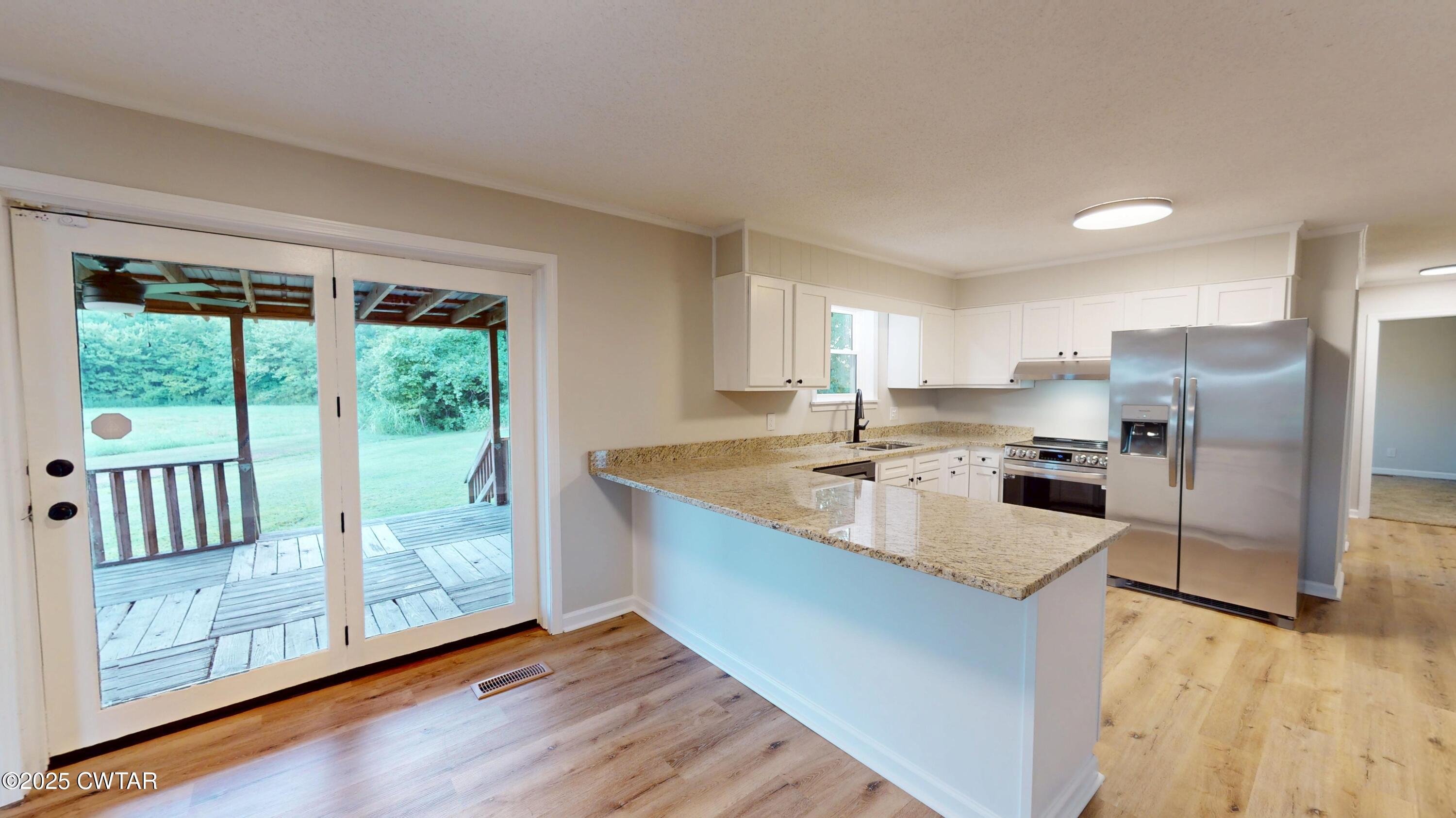 1421 Morgan Road Dyersburg, TN 38024 - Photo 8 of 37 1421-Morgan-Rd-KitchenDining