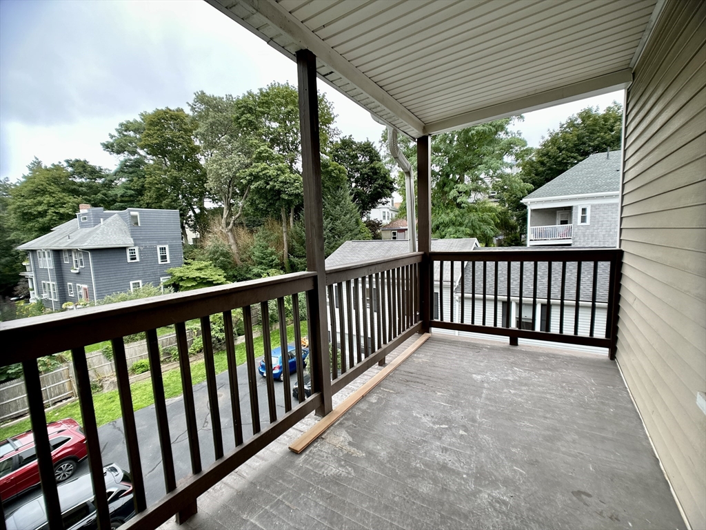 22 Spring Park Avenue, Unit 3 Boston, MA 02130 - Photo 3 of 11 a view of a wooden deck
